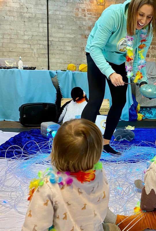 Children playing with bubbles at a StoryBox party